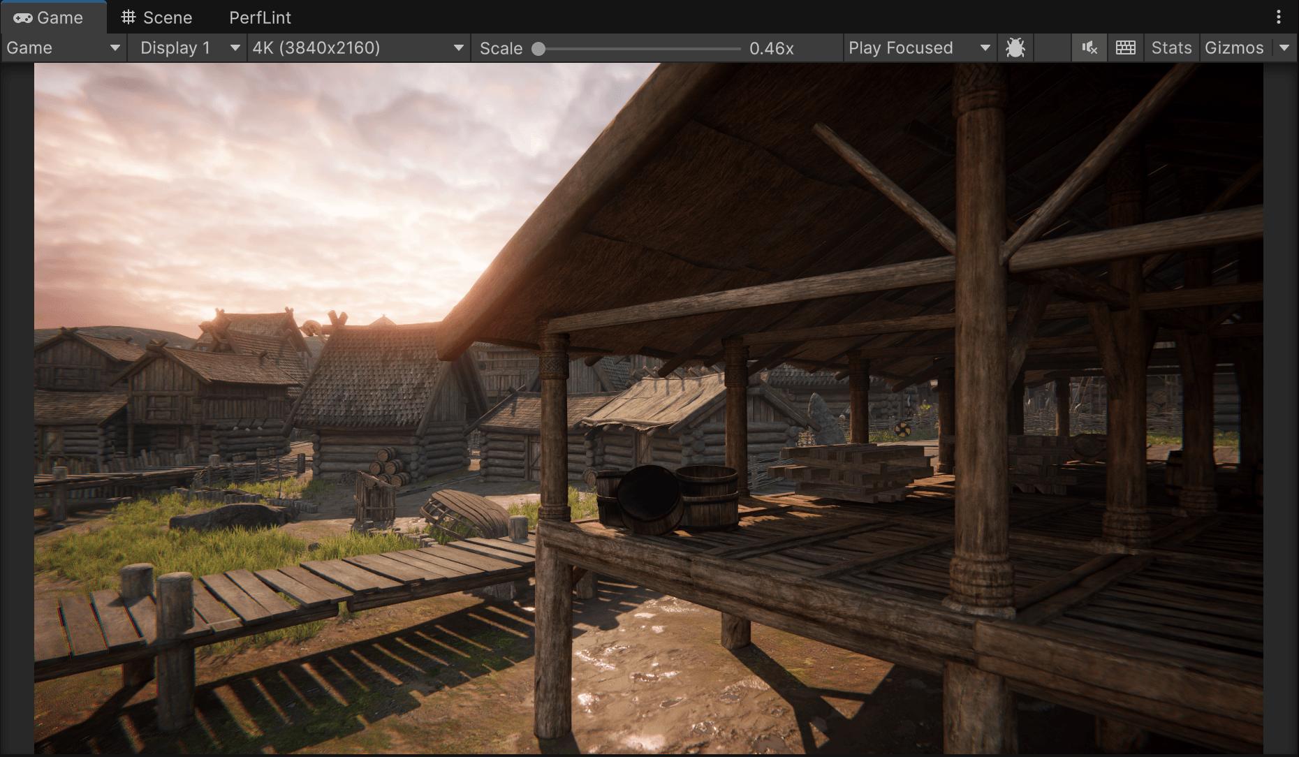 Viking Village in the game view after migration, sunset over the docks with the water system running
